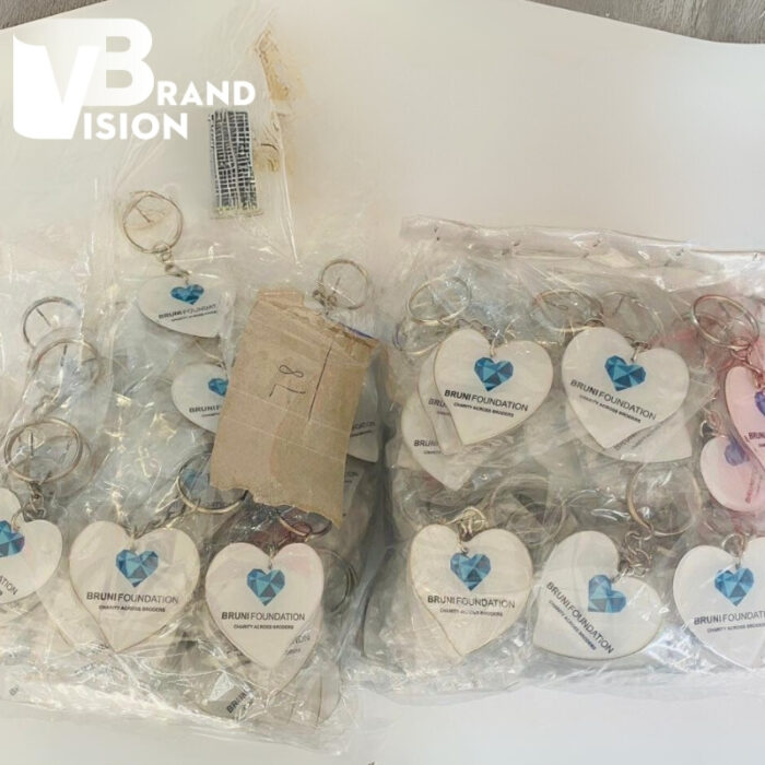 moc-khoa-in-logo-cong-ty-bruni-foundation-hinh-trai-tim-do-keo-khong-vien-mk-02-2